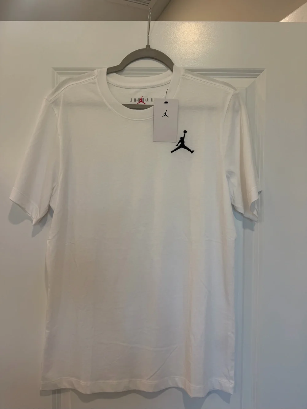 Jordan White Short Sleeve Tee with Black Jumpman - M